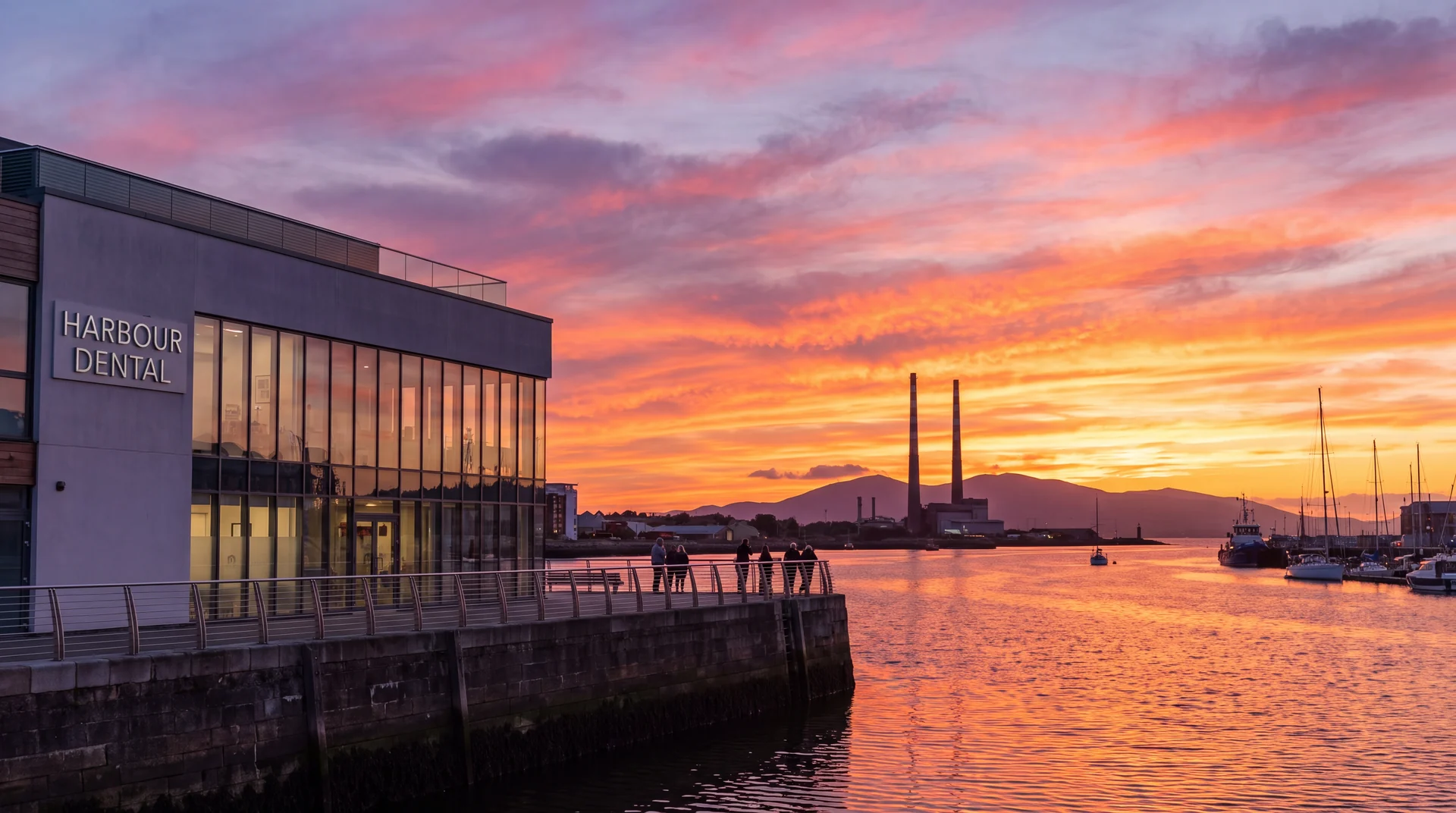 Harbour Dental at sunset, seen across the water